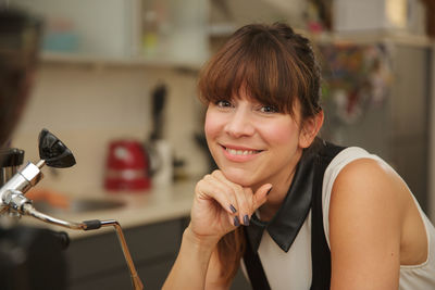 Portrait of smiling young woman