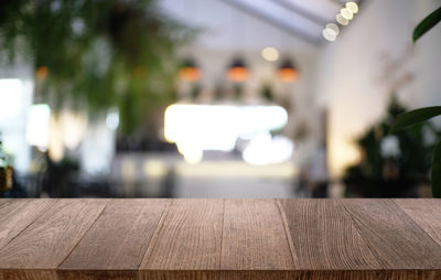 Close-up of wooden table at restaurant