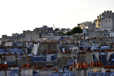 High angle view of buildings in city against sky