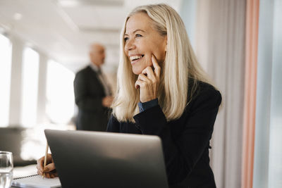 Businesswoman sitting in office