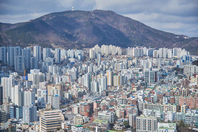 Aerial view of cityscape against sky