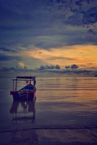 Scenic view of sea at sunset