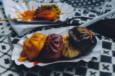 Close-up of food in plates on table