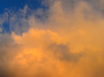 Low angle view of cloudy sky during sunset