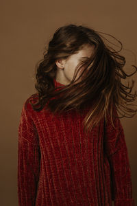 Close-up of a young woman with red hair