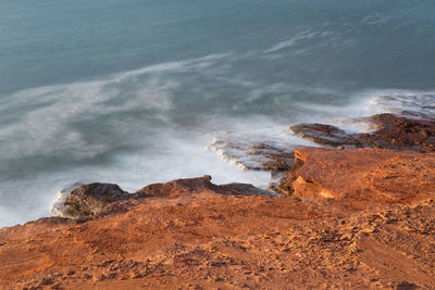 Rock formations on shore