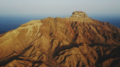 Scenic view of rock formation against clear sky