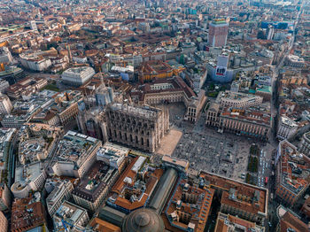 Aerial view of piazza duomo in front of the gothic cathedral in the center.