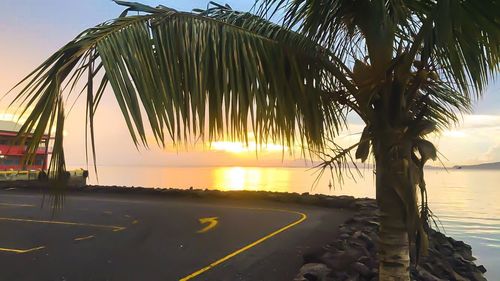 Scenic view of sea against sky at sunset