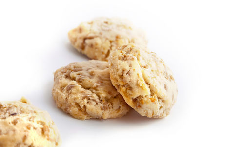 Close-up of cookies against white background