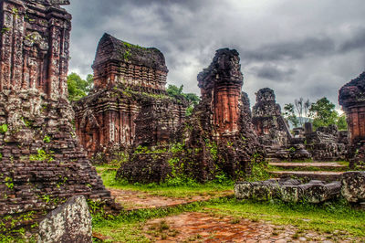 Panoramic view of temple against buildings