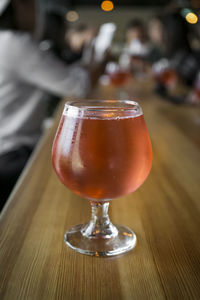 Close-up of beer glass on table