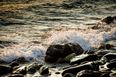 Sea waves splashing on rocks