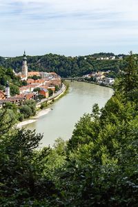 High angle view of river amidst buildings in town