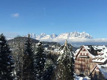 Snow covered houses in town