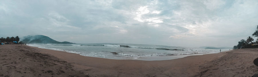 Panoramic view of beach against sky