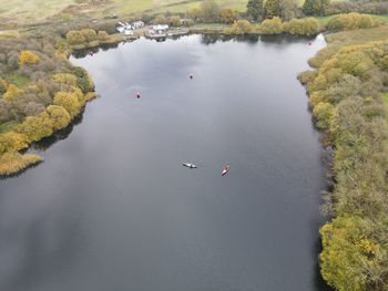Drone photos of a lake and forest in east yorkshire, uk. autumn colours and stunning sky reflections