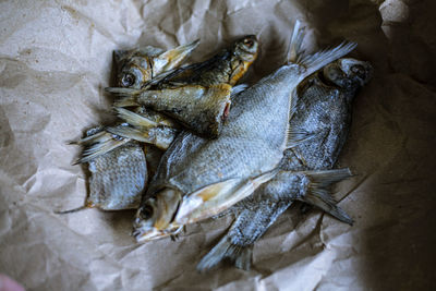 Fried fish on paper