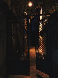 Illuminated entrance gate at night