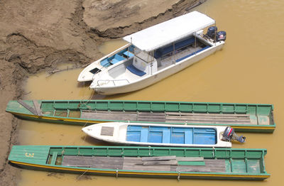 Boat moored in water