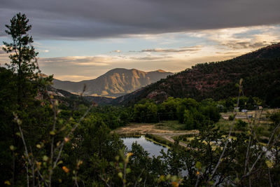 Scenic view of mountains against sky during sunset