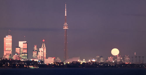 Illuminated buildings in city at night