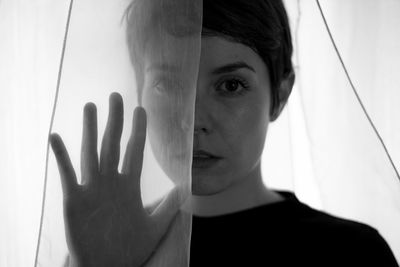 Close-up of hands against white background