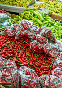 Red chili peppers for sale at market stall