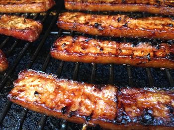 Close-up of meat on barbecue grill