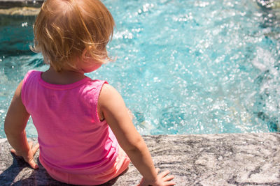 Cute girl in swimming pool