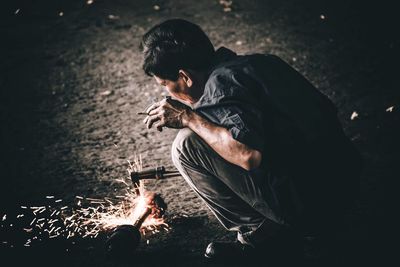 Man and woman in bonfire