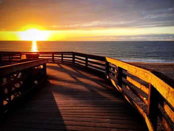 Scenic view of sea at sunset