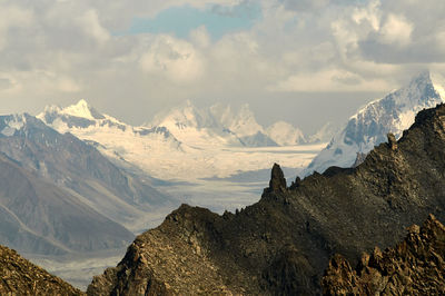 Scenic view of snowcapped mountains against sky