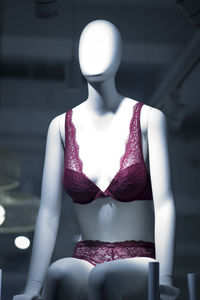 Midsection of mannequin in store