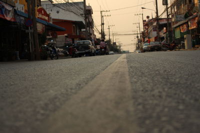 Surface level of road against buildings in city