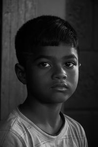 Close-up portrait of boy looking away