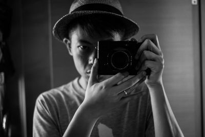 Midsection of man photographing