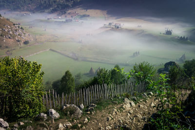 Panoramic view of field against sky