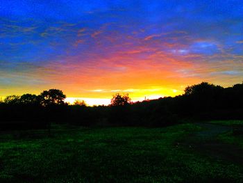 Scenic view of landscape at sunset