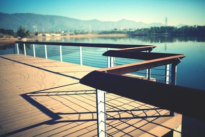 Jetty leading to calm lake