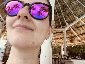 Portrait of young woman wearing sunglasses