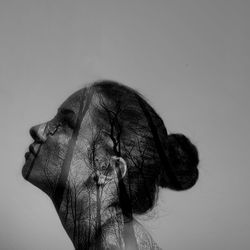 Close-up of senior man against white background