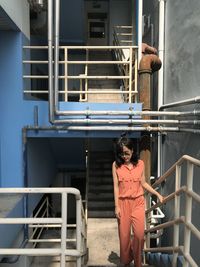 Portrait of woman going up the stairs 