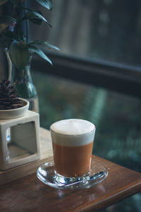 Close-up of coffee cup on table