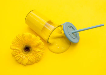 Close-up of yellow flowers on table