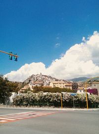 Road against blue sky and clouds