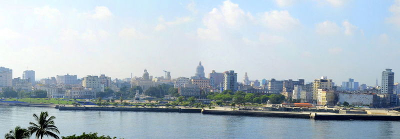 Buildings in city against sky