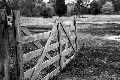 Old wooden fence on field