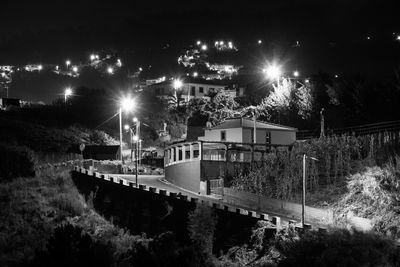 Illuminated street lights at night