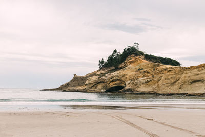 Cliff on the the beach at oregon coast, cape kiwanda state natural area